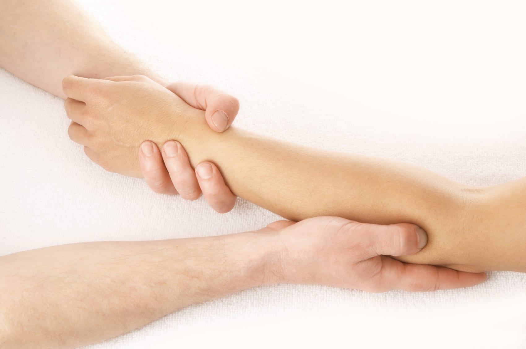 https://www.tlcmassageschool.com/wp-content/uploads/2012/02/HandsonArm.jpg