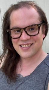 Head shot of Tim Sta